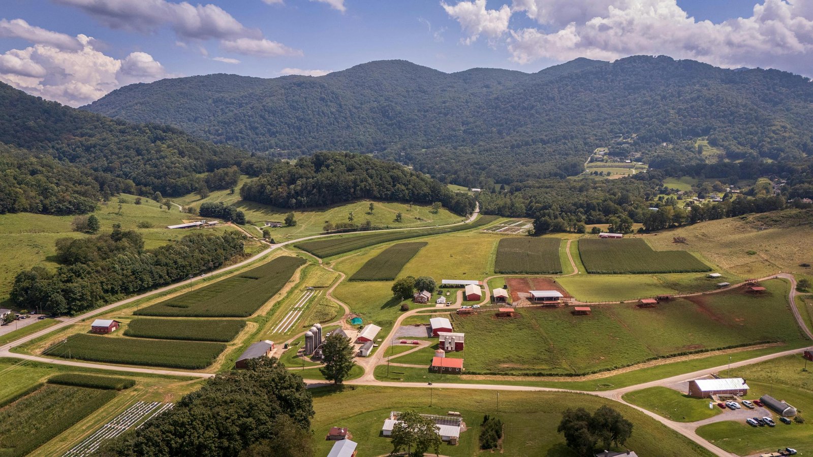 A scenic aerial shot of farmland in the Appalachian Mountains during summer.