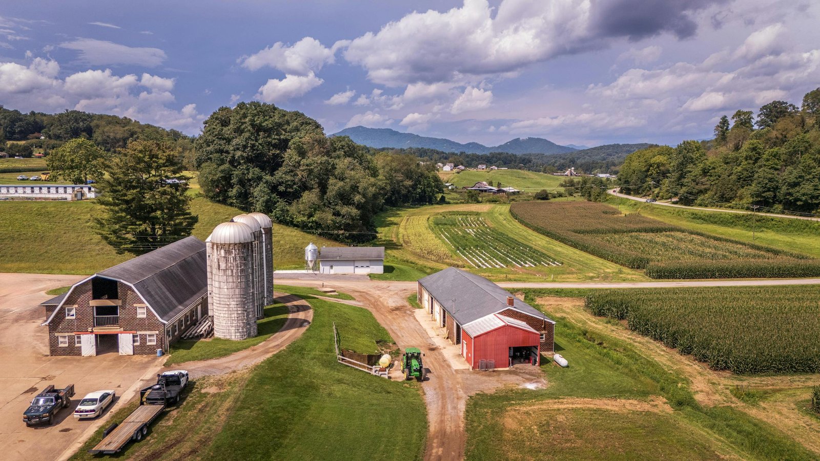 Aerial view of a farm with silos and barns in the North Carolina countryside