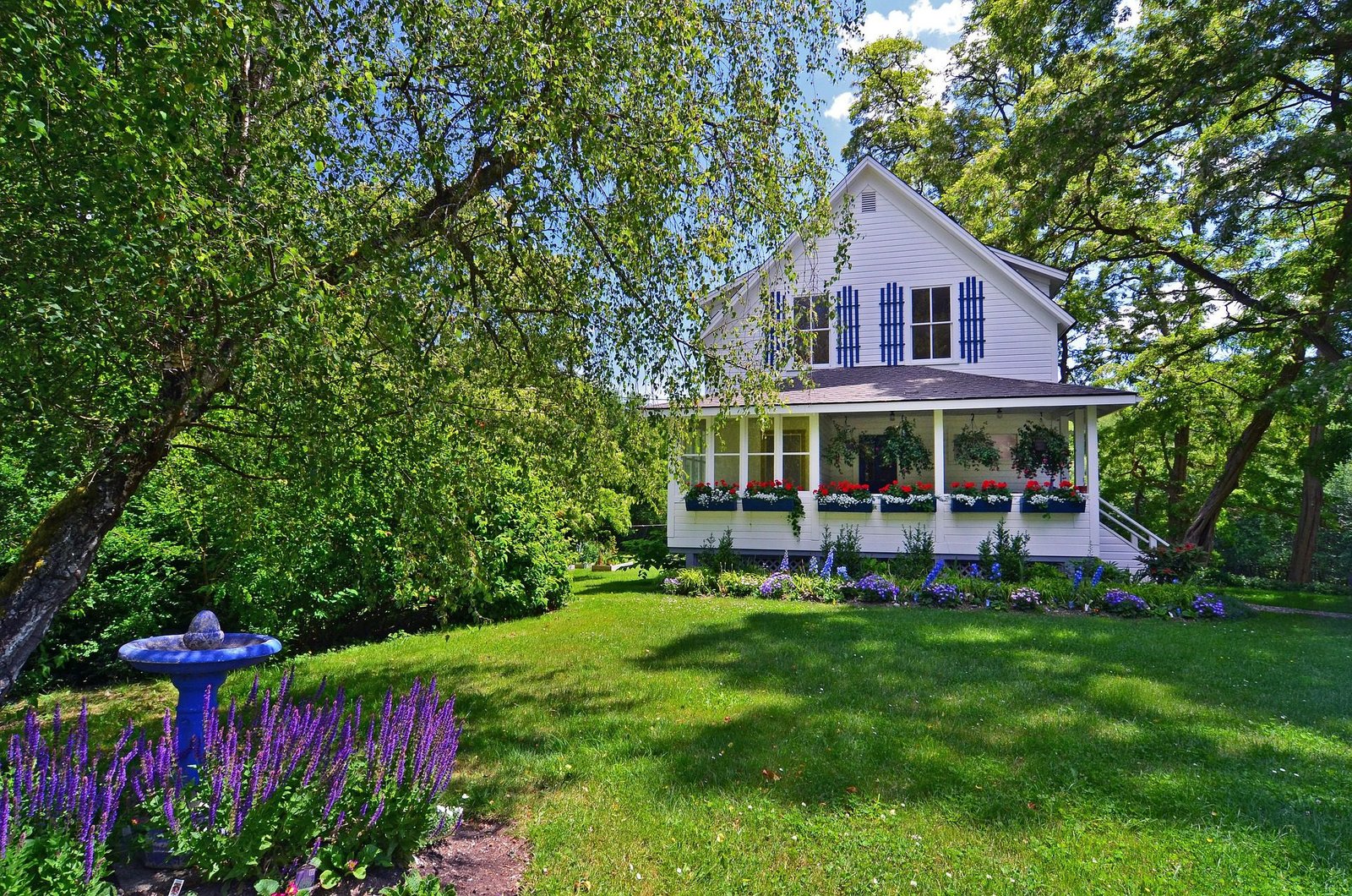 Sun drenched Tennessee farmhouse on a bright summer day
