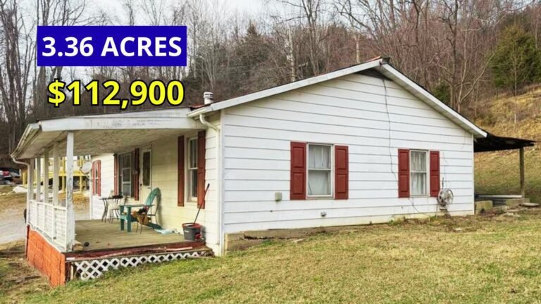 Exterior view of a move-in ready ranch home with barn and dairy cellar on 3.36 acres for sale at $112,900 in Cleveland, Virginia
