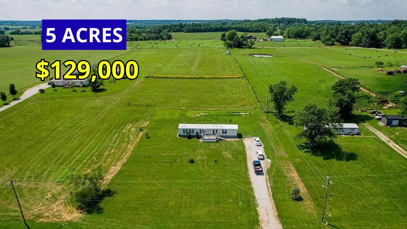 Exterior view of a tenanted home on 5 acres for sale at $129,900 in Hodgenville, Kentucky