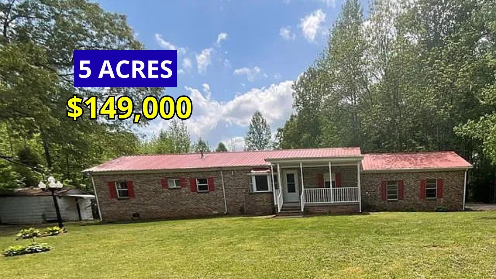 Exterior view of a completely remodeled brick home on 5 acres for sale at $149,000 in Bruceton, Tennessee