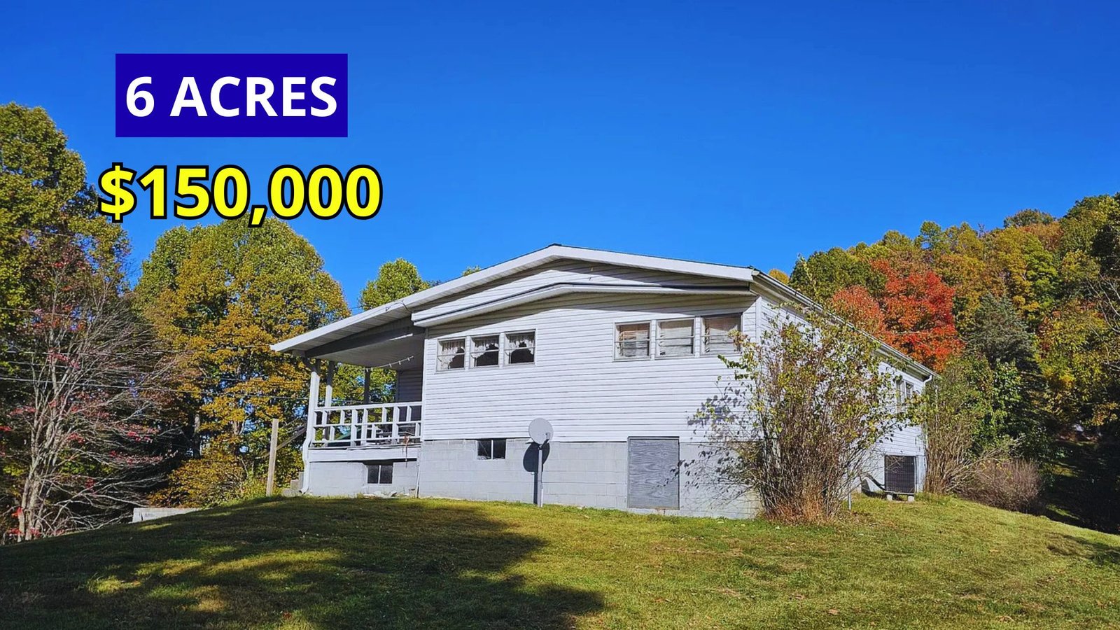 Exterior view of a move-in ready home with mountain views on nearly 6 acres for sale at $150,000 in Coeburn, Virginia