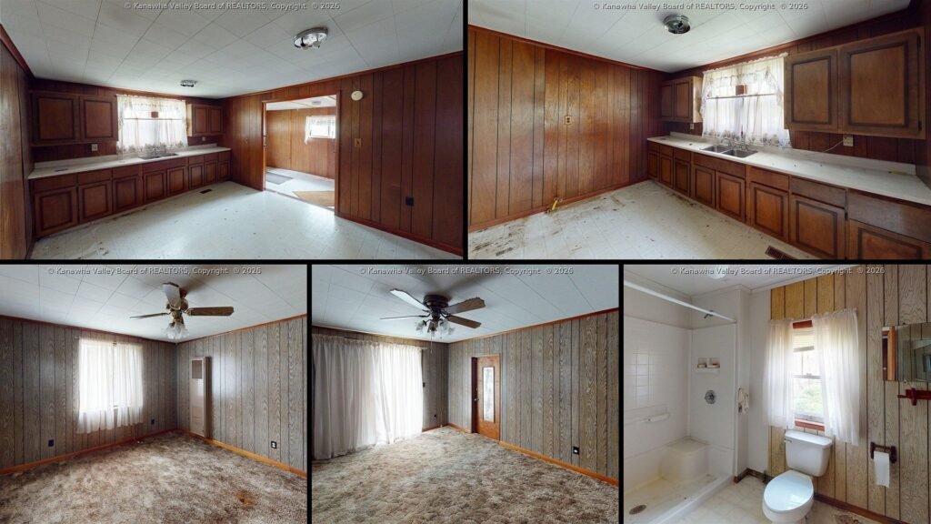 Interior of cheap farmhouse for sale in West Hamlin, West Virginia — a long living room and a separate den.