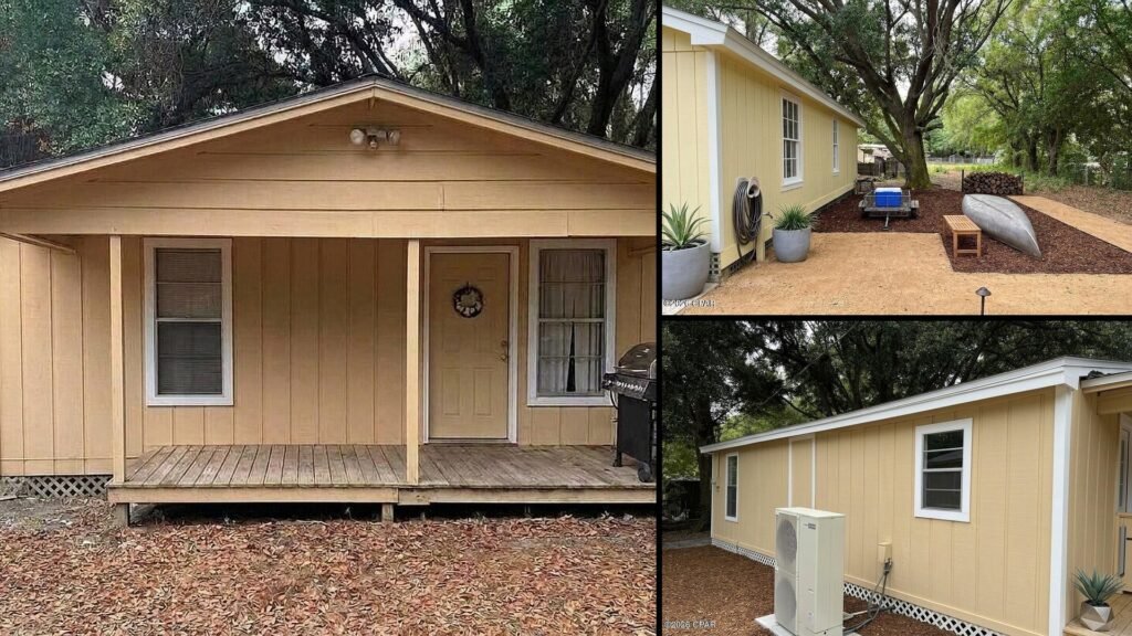 Exterior and land of a rural property for sale in Quincy Florida — a fifth of an acre, fenced and shaded by large oaks, a short walk from Lake Talquin