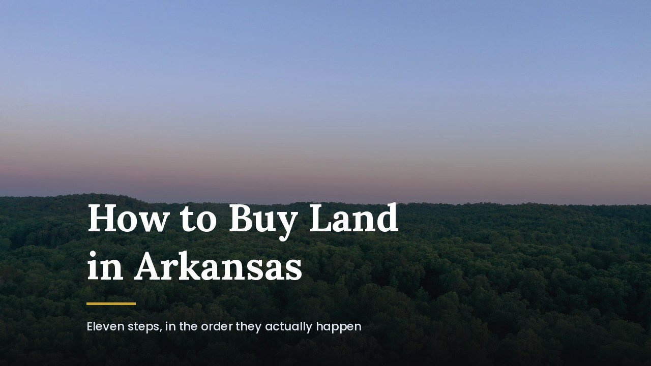 Guide to buying land in Arkansas, wooded Ozark ridgeline at dawn